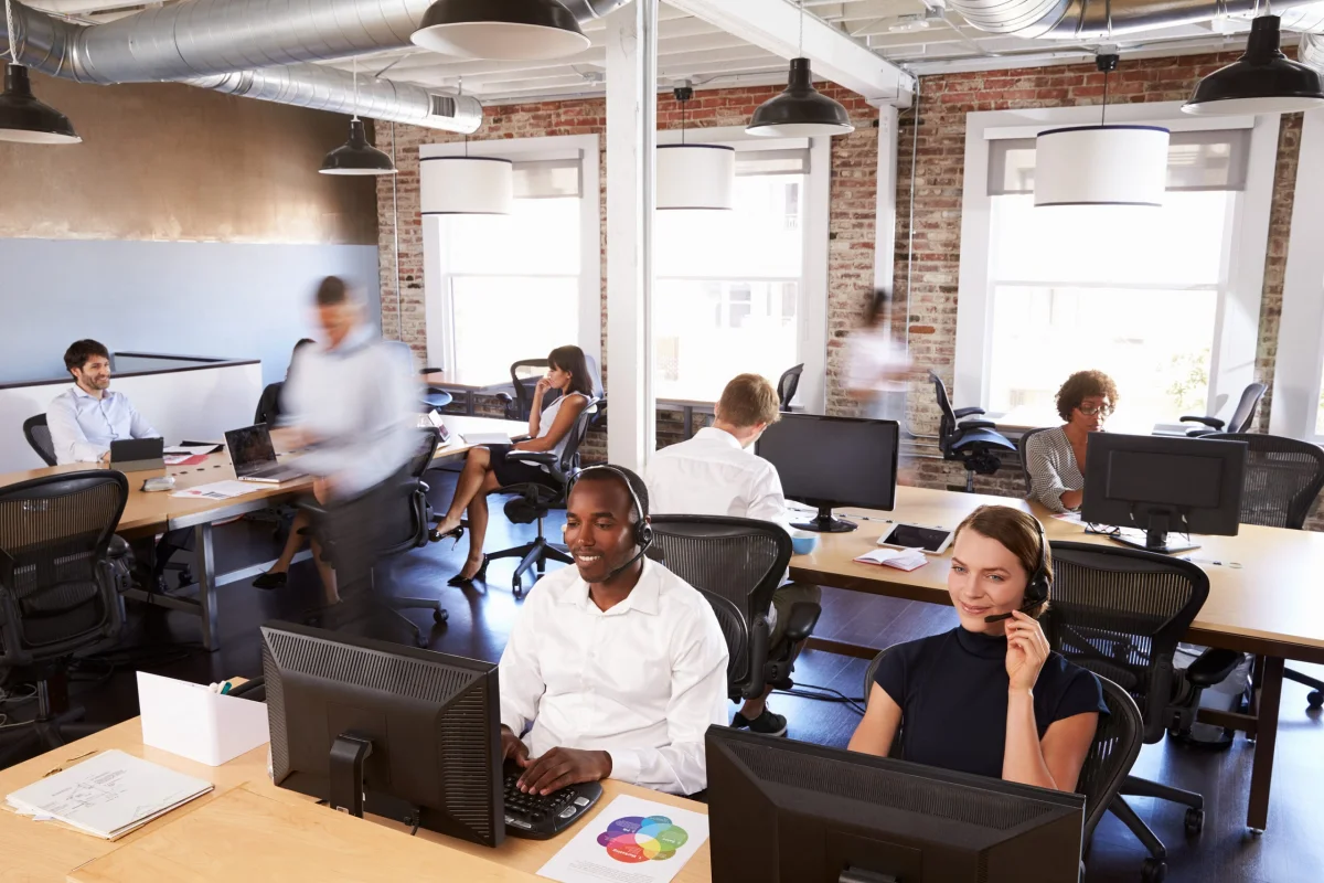 Busy-telesales-team-working-in-an-open-plan-office-scaled